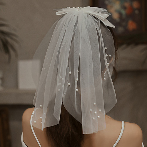 One-tier Cute Wedding Veil Shoulder Veils with Faux Pearl / Satin Bow 15.75 in (40cm) Lace / Tulle
One-tier Cute Wedding Veil Shoulder Veils with Faux Pearl / Satin Bow 15.75 in (40cm) Lace / Tulle