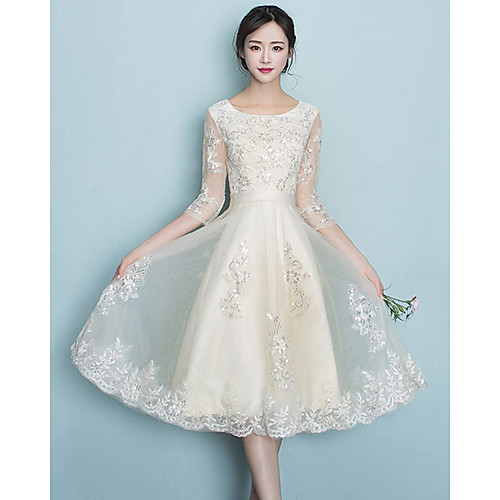 

A-Line Jewel Neck Knee Length Tulle Bridesmaid Dress with Appliques