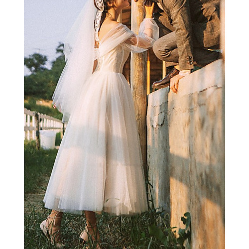 

A-Line Wedding Dresses Off Shoulder Ankle Length Tulle Long Sleeve Country Romantic with Buttons Cascading Ruffles 2021