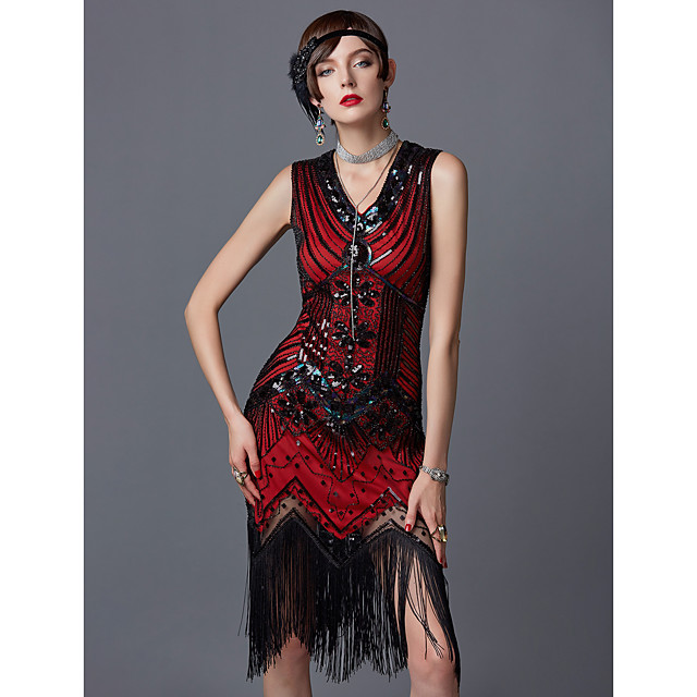 lady wearing 1920s black and red dress with beaded headband 