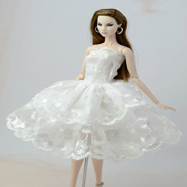 barbie doll in white dress