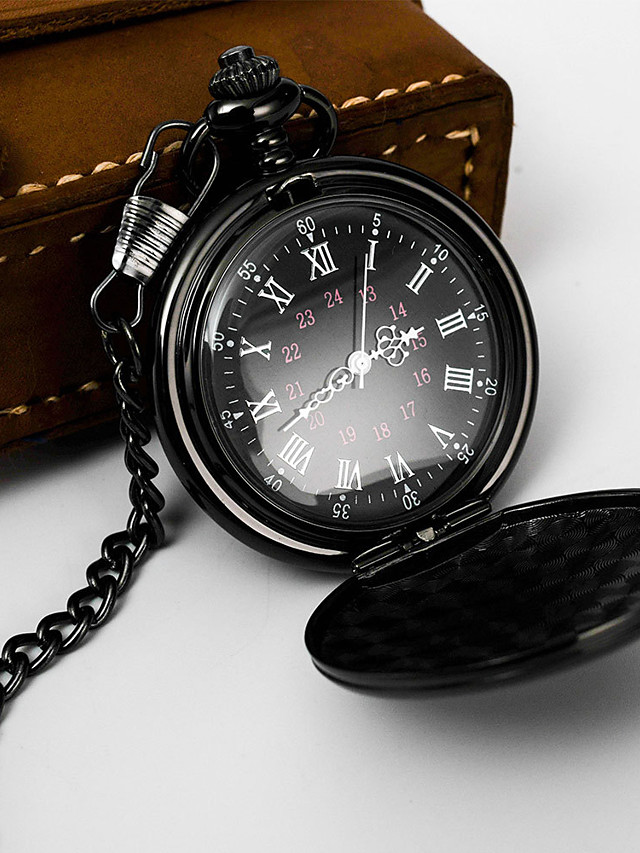 black and gold pocket watch
