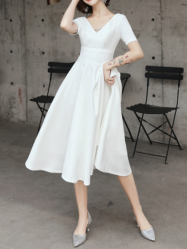 minimalist white dress