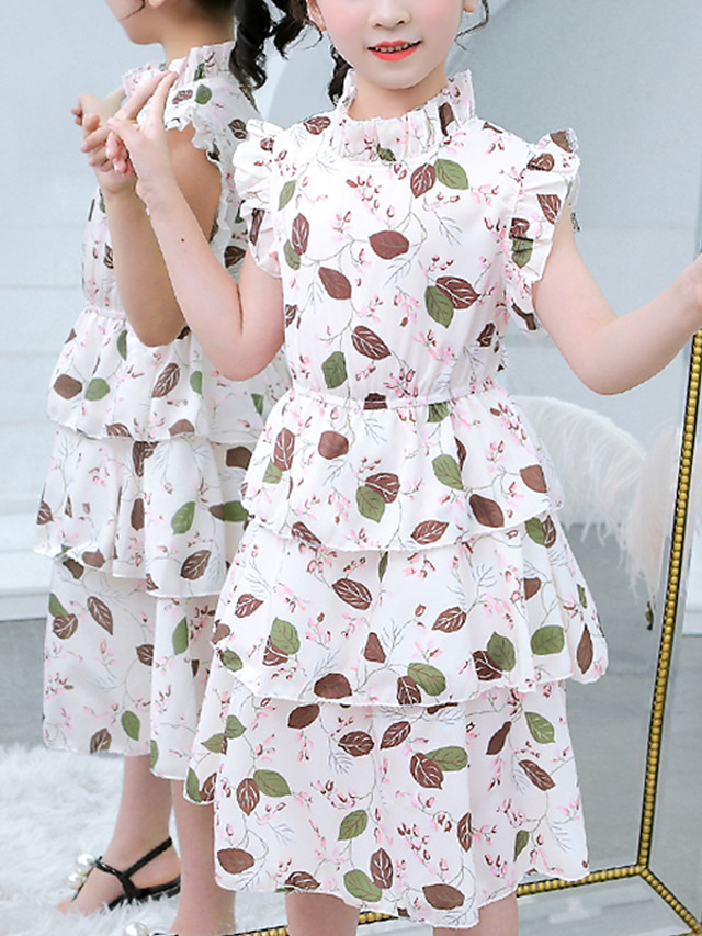 white floral knee length dress