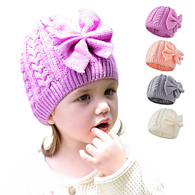 New Woolen Yarn Pure Color Bowknot Knitted Hat Manufacturer Spot Warm Dome Twist Children's Hat
