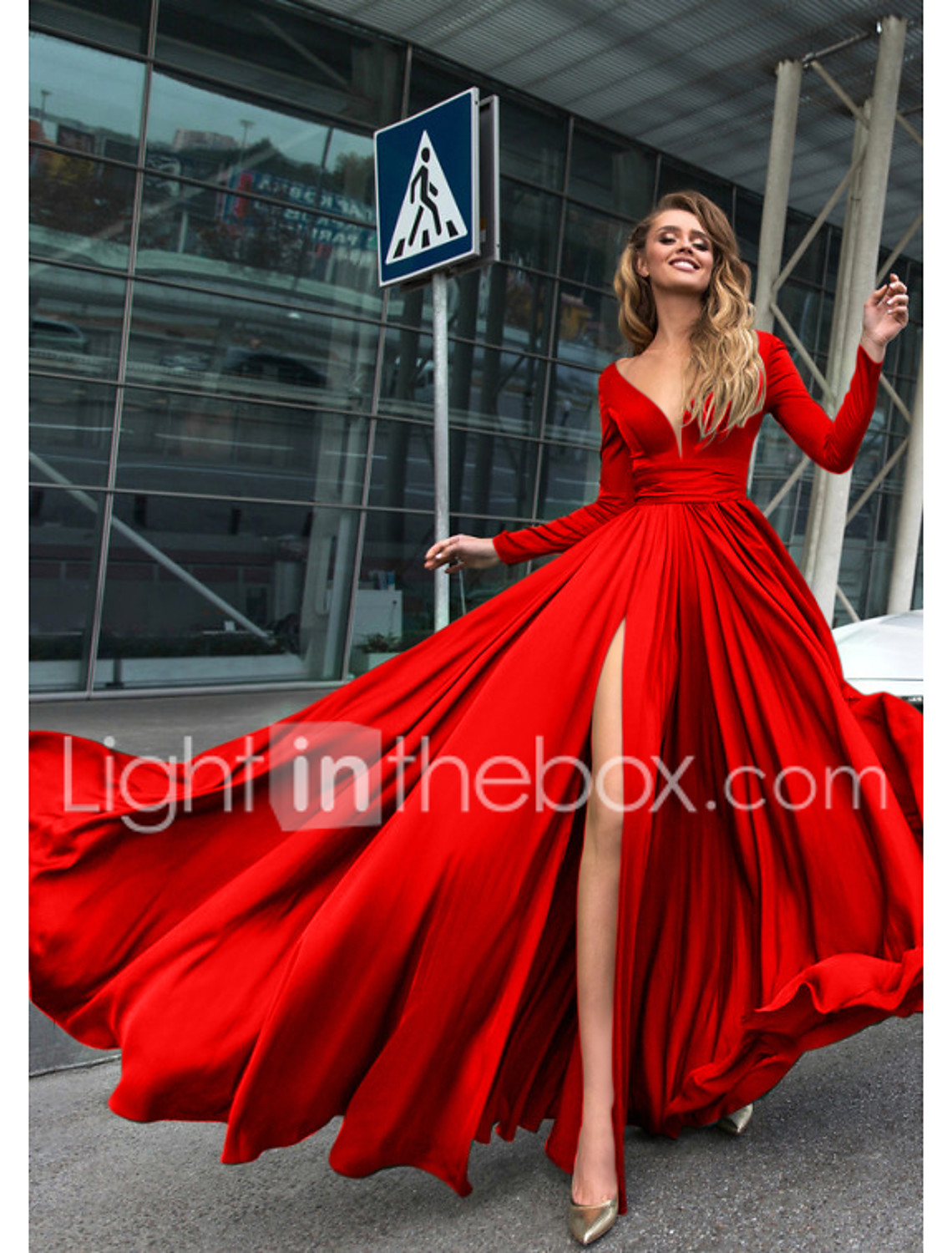 Long flowing satin red gown with slit